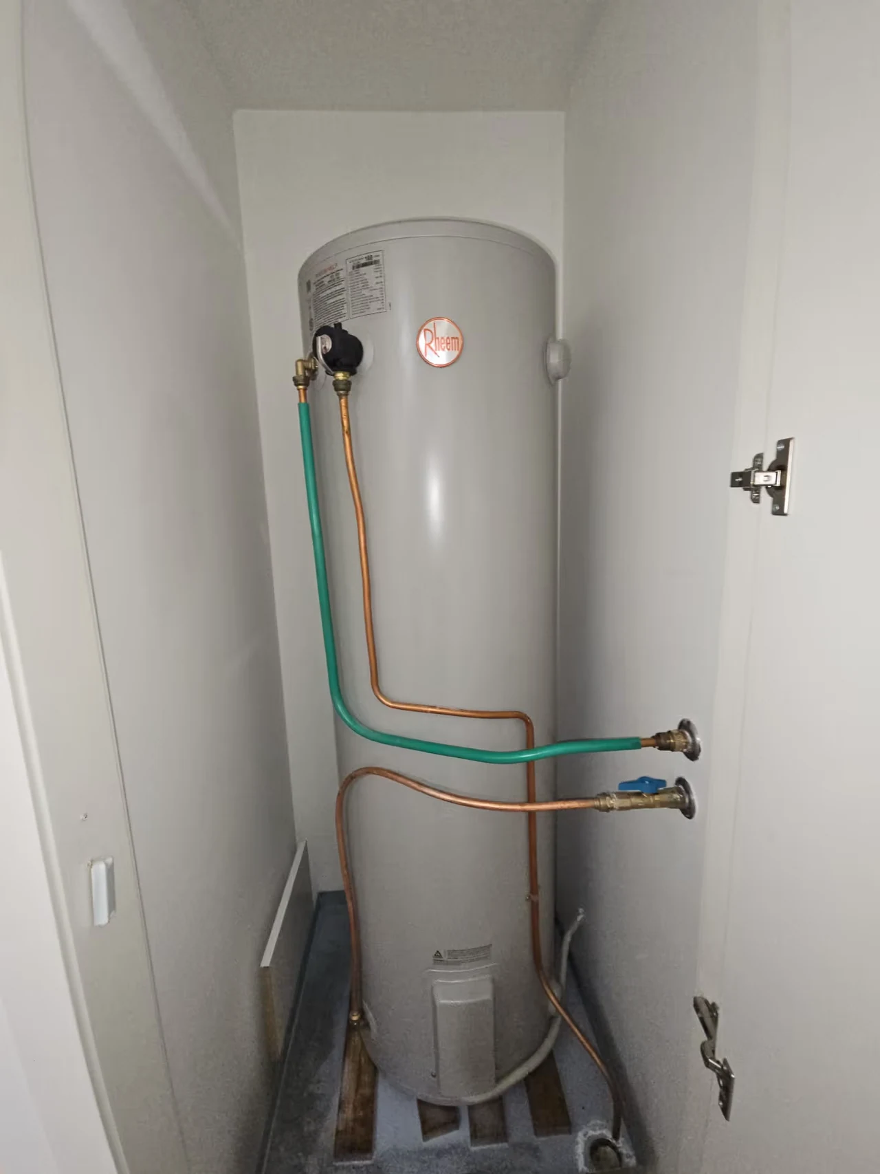Storage hot-water cylinder with its original pipework and fittings